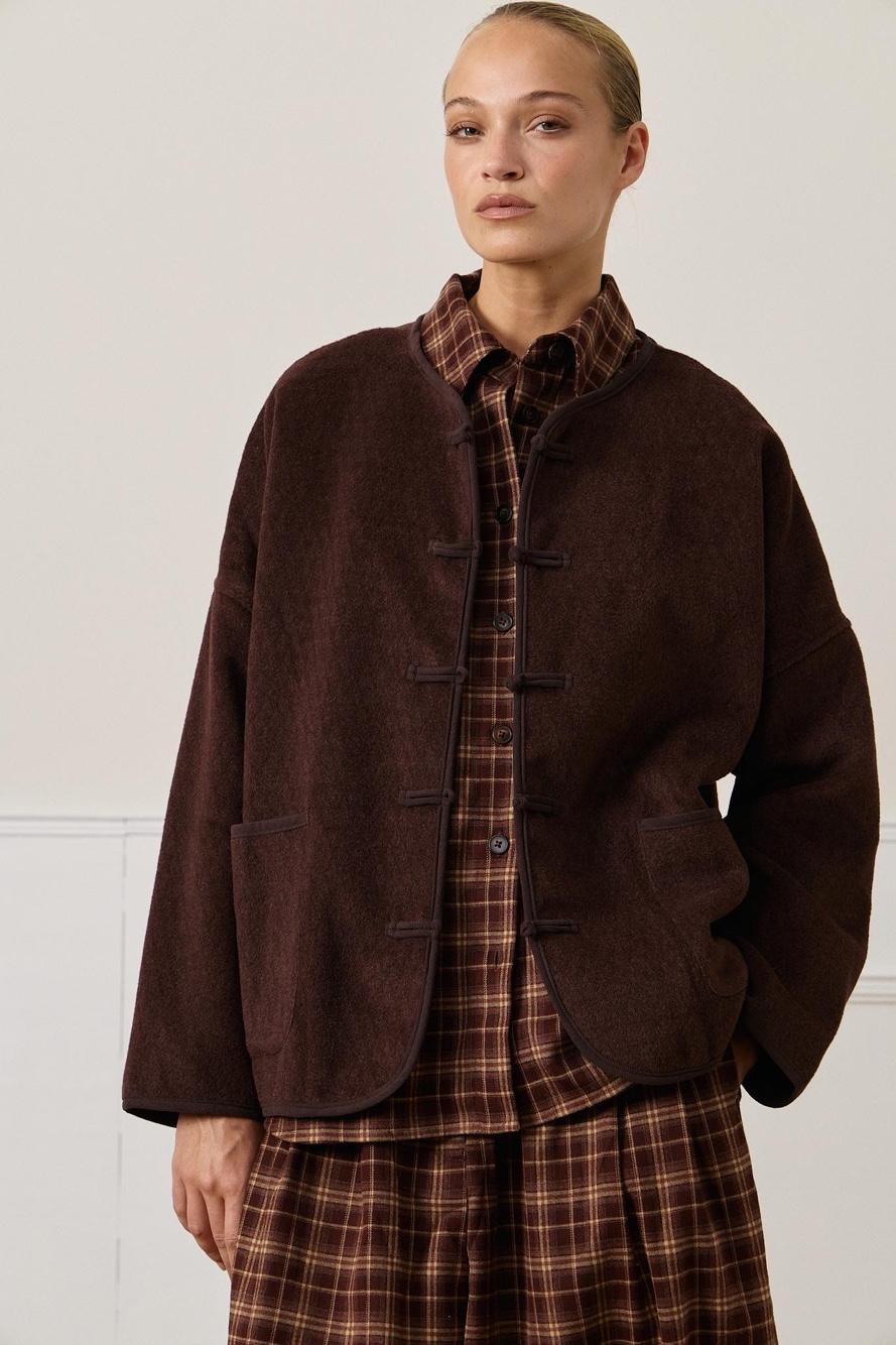 Oversized bunda s kapsami